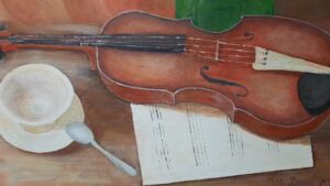 Obraz malowany na płótnie skrzypce leżące na stole, na kartce papieru do nut, obok filiżanka ze spodeczkiem i łyżeczką