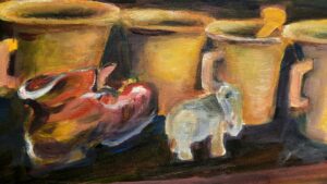 Obraz malowany na płótnie - cztery kubki, figurki słonika i kamasza