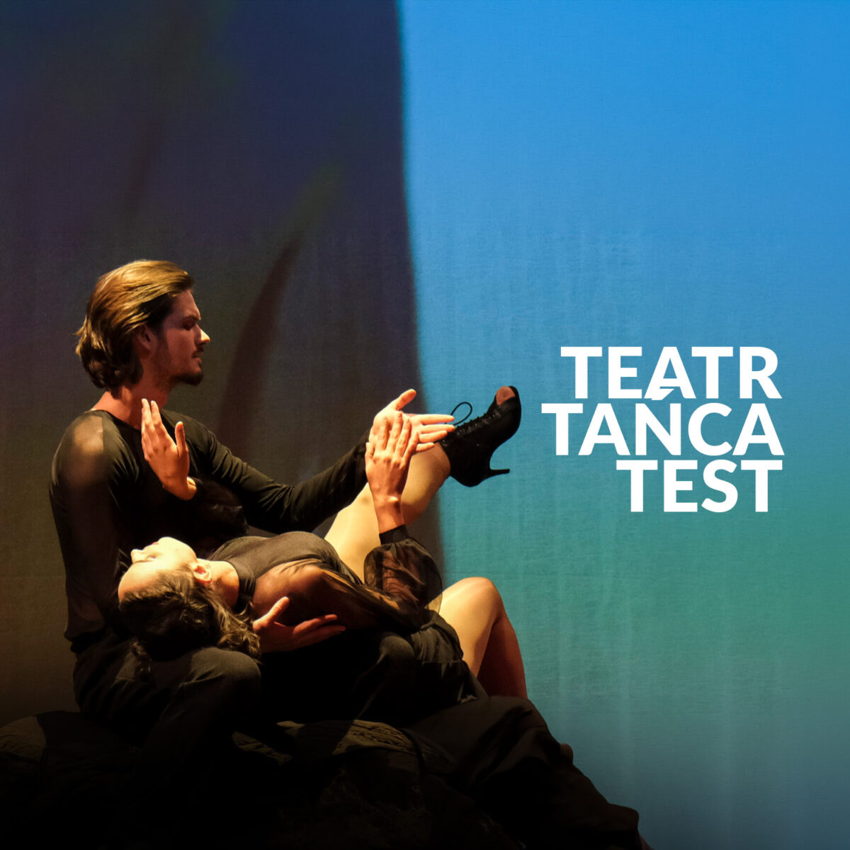Fotografia pary tancerzy. Napis "Teatr Tańca TEST"